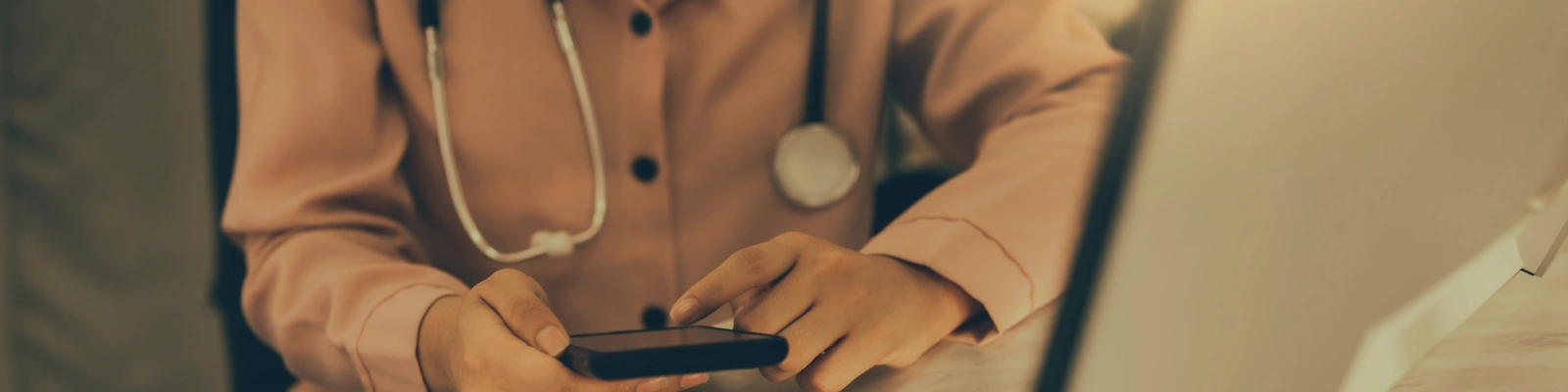 doctor holding a mobile phone