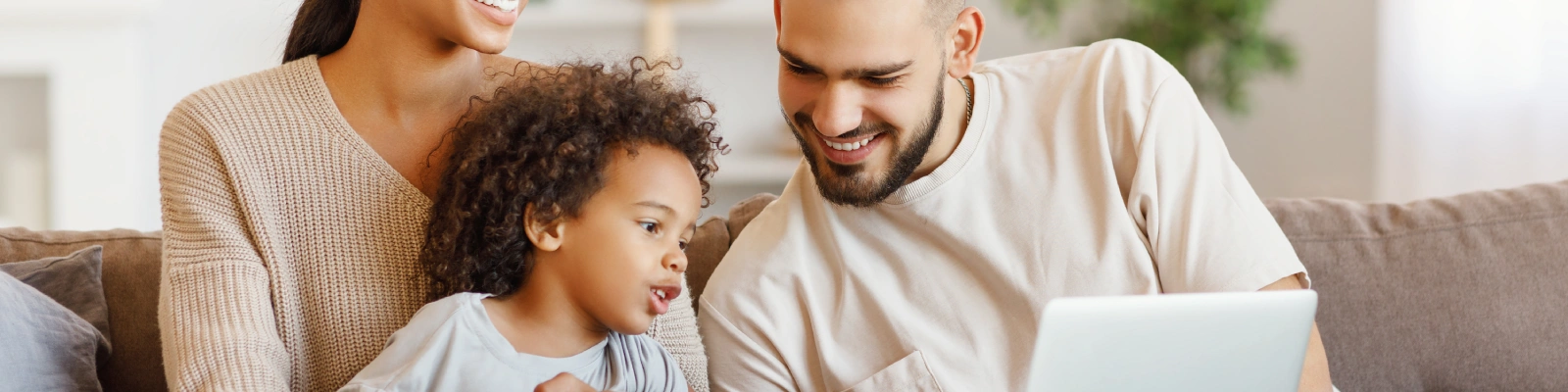 family using a laptop