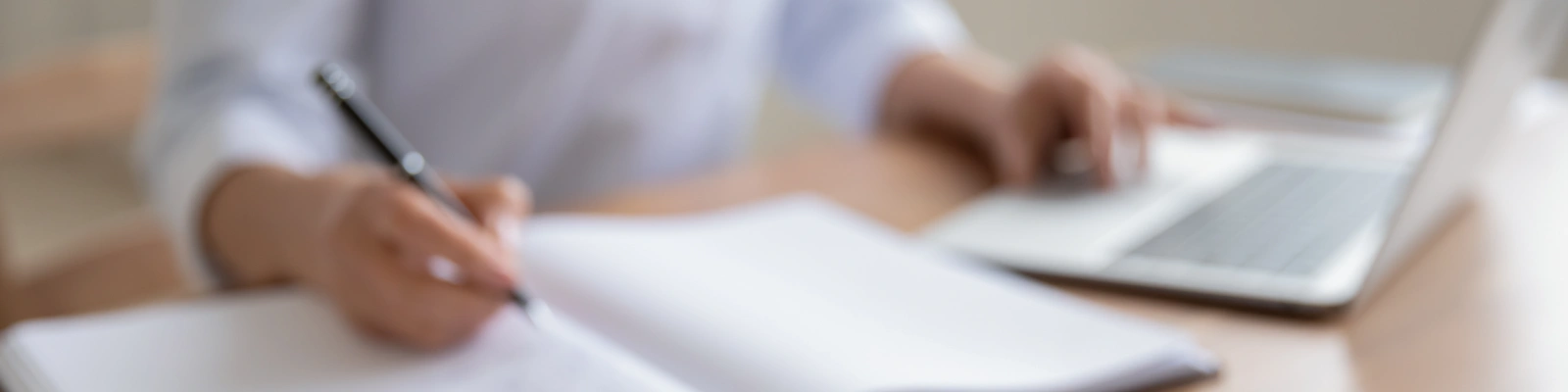 using a laptop whilst writing